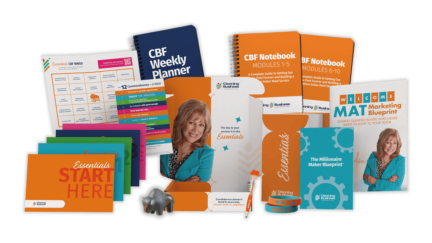 display of the cleaning business fundamentals program kit including books, planner, and program guides